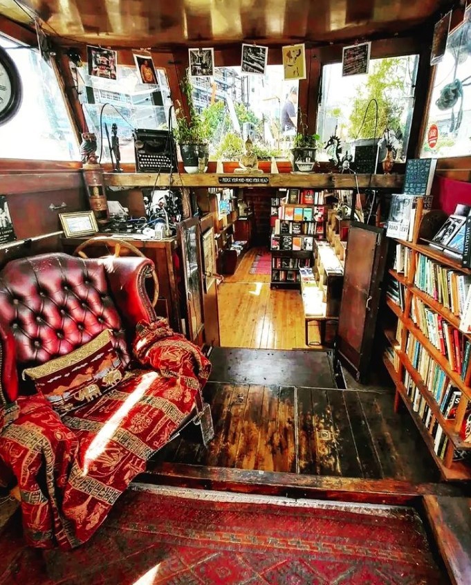 Image of the interior of a barge that is a floating bookstore