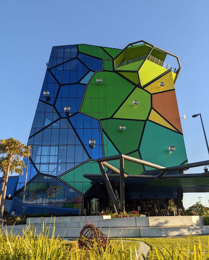 Image of a building covered in brightly coloured panels
