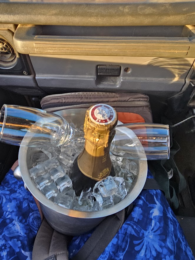 Image of a bottle of champagne in an ice bucket